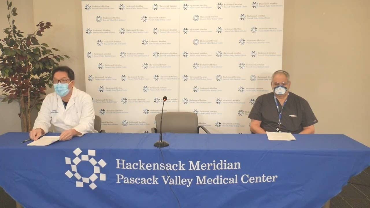 doctors sitting covid safe apart